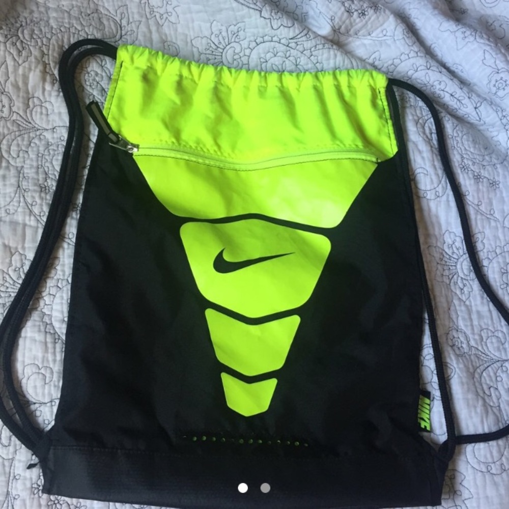 Neon green and black Nike drawstring bag